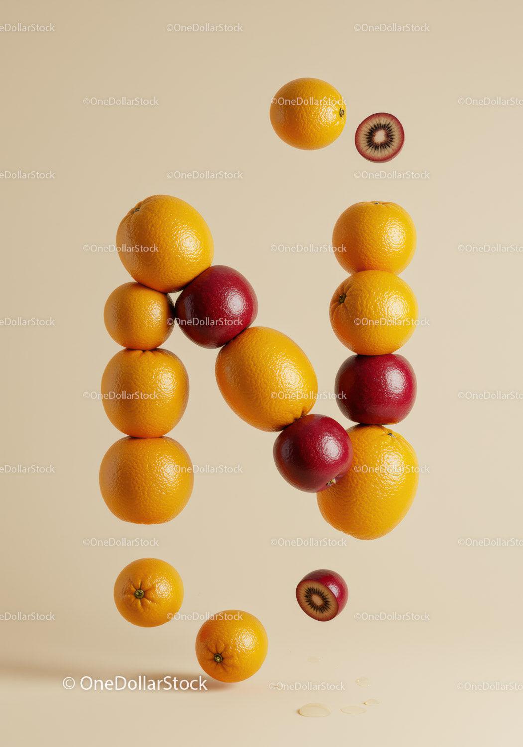 Creative fruit arrangement forming the letter N on beige