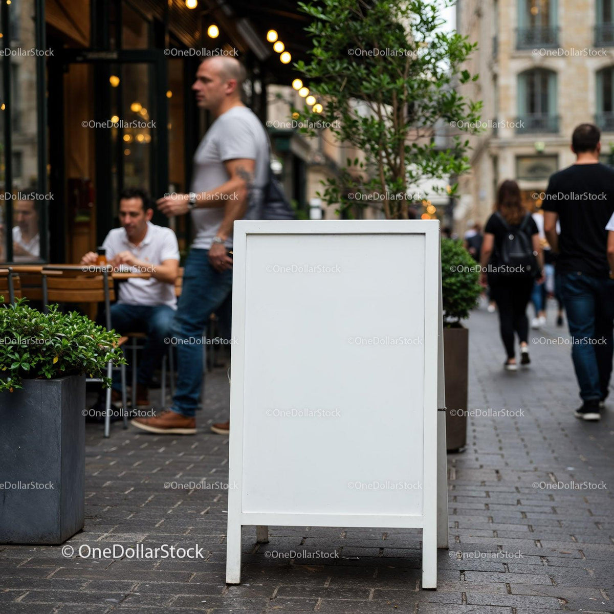 Empty white signboard on busy street with pedestrians JPG Mockup Image preview