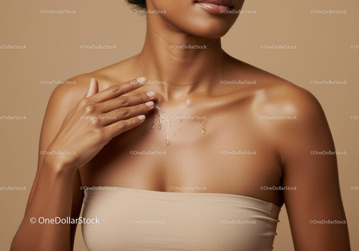 Close-Up of Woman Applying Body Lotion with Smooth Skin and Soft Lighting