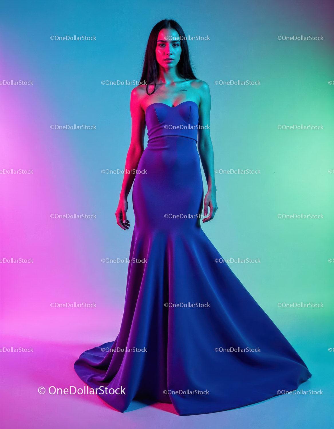 Elegant Woman in Blue Evening Gown with Vibrant Lighting