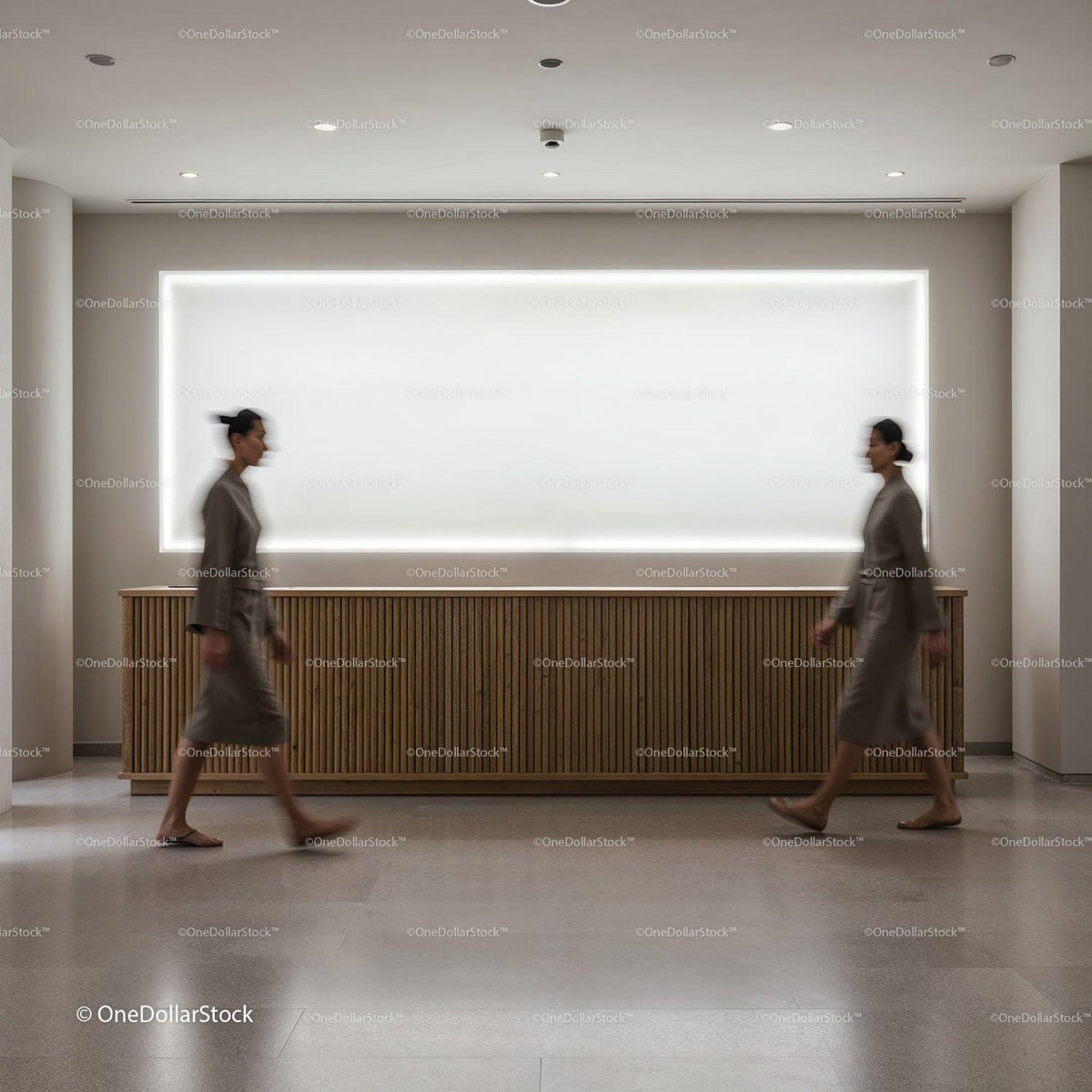 Blurred motion of woman walking in minimalist lobby JPG Mockup Image preview