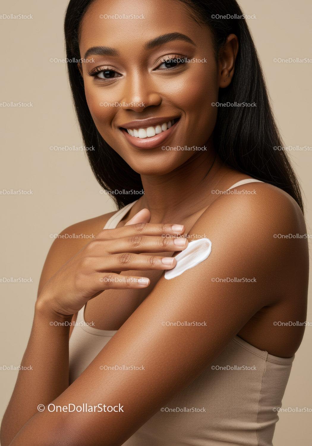 Beautiful Woman Applying Lotion to Arm for Healthy Skin