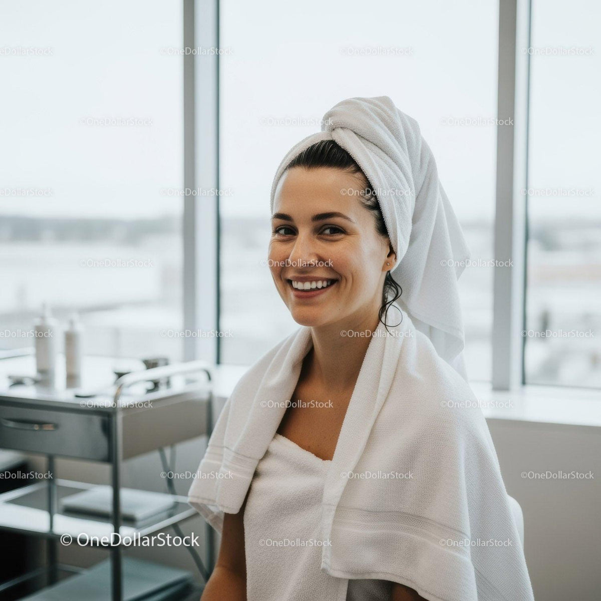 Bright Smiling Woman with Towel Turban at Spa Relaxation Center