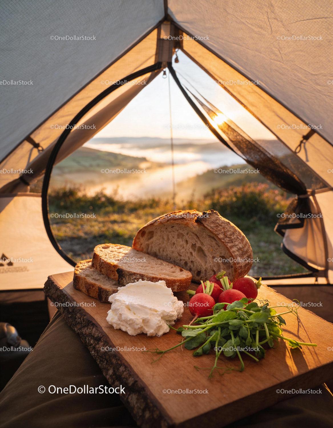 Rustic Breakfast with Bread and Fresh Vegetables in Tent