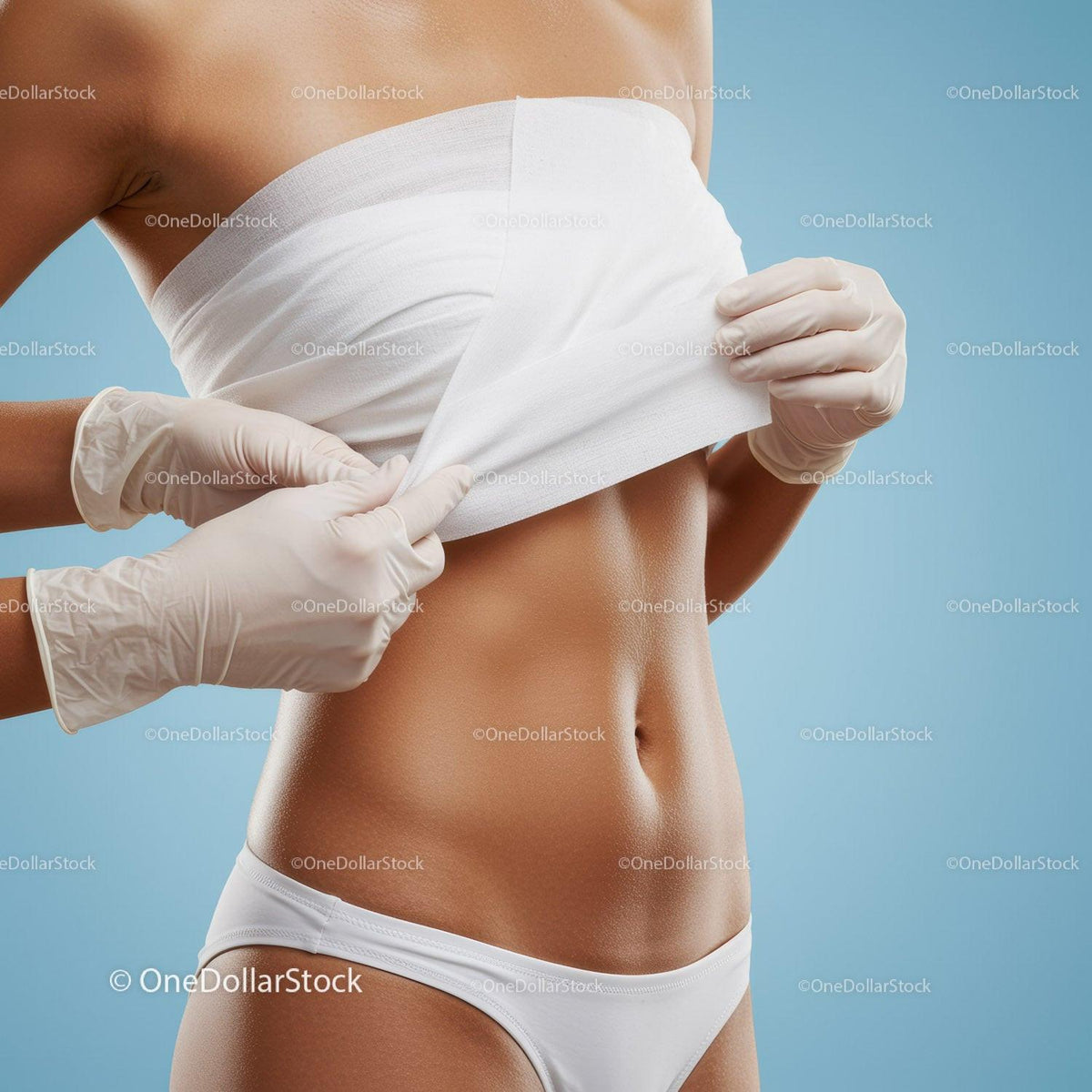 Woman Getting Abdominal Skin Tightening or Body Contouring Treatment