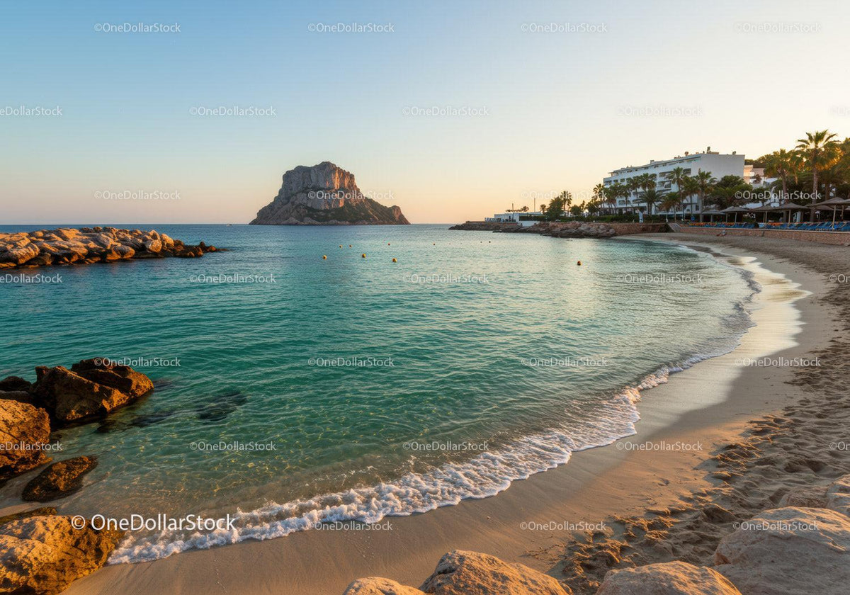 Scenic Beach with Rocky Shoreline and Mountain in Sunset Light