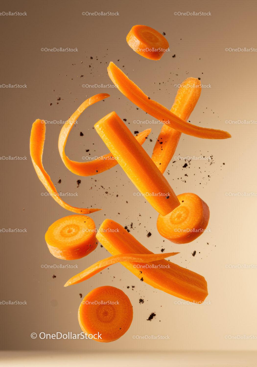 Fresh Carrot Slices and Peels Floating in Air