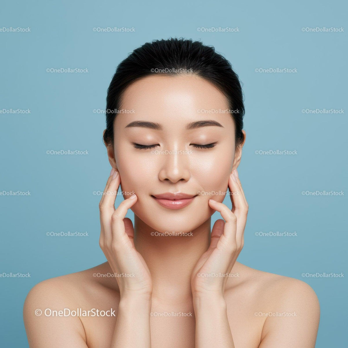 Young Woman with Clear Skin and Relaxed Expression on Blue Background