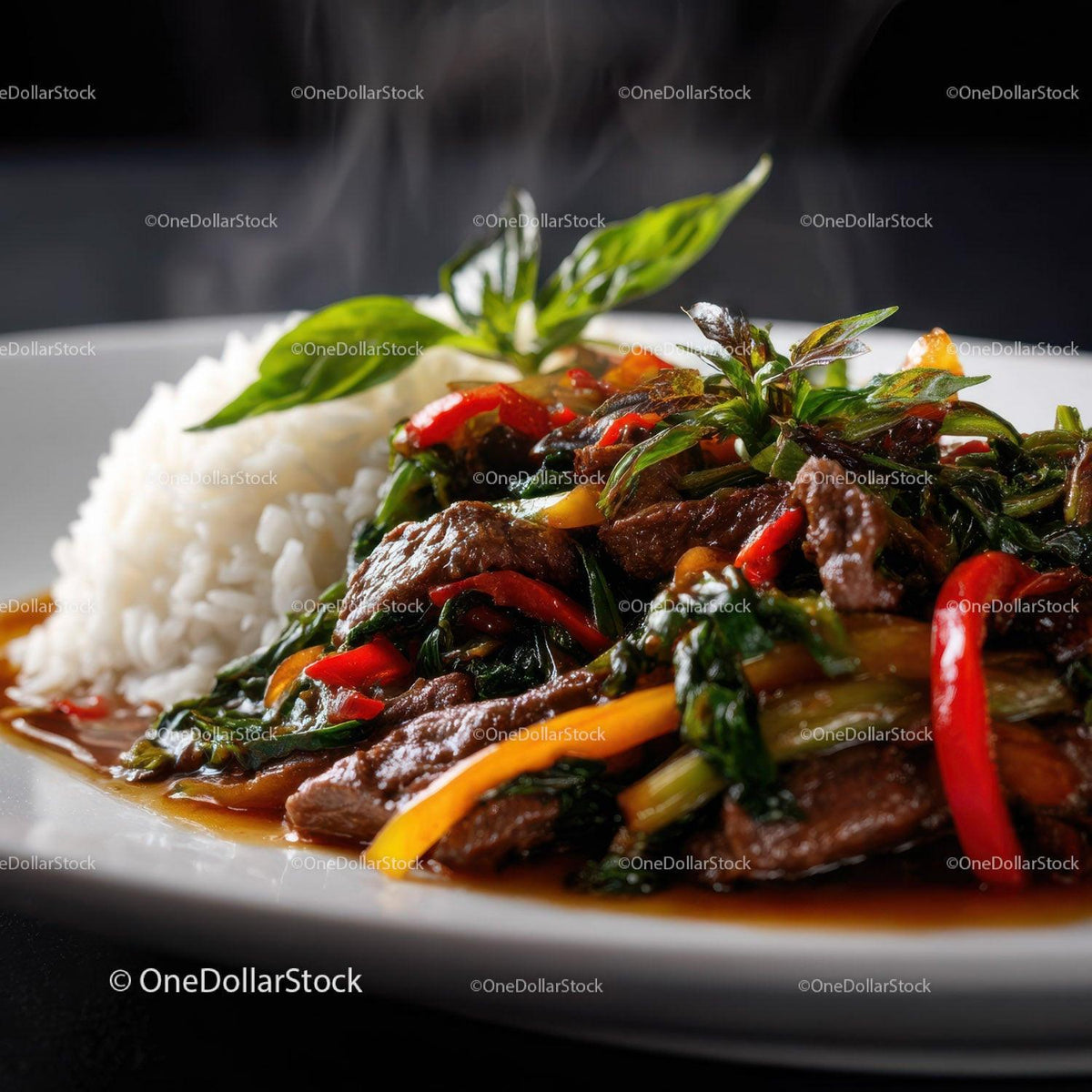 Stir-Fried Beef with Bell Peppers and Leafy Greens on a White Plate