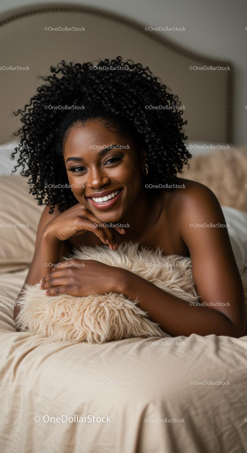Smiling woman relaxing with cozy pillow on bed