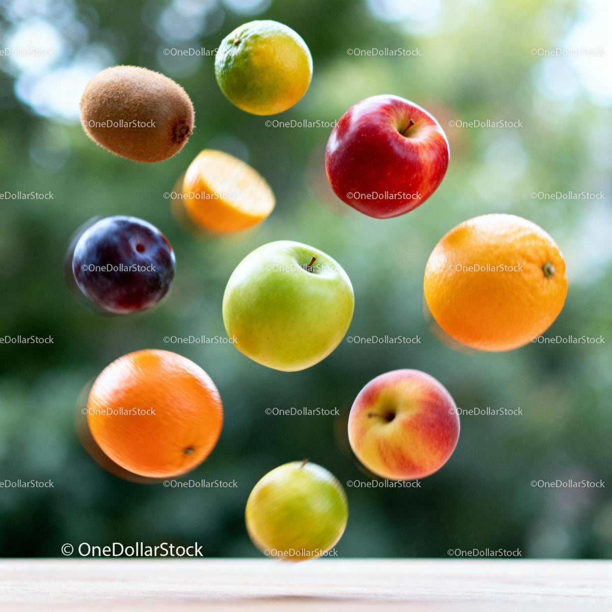 Variety of fresh fruits floating in natural light