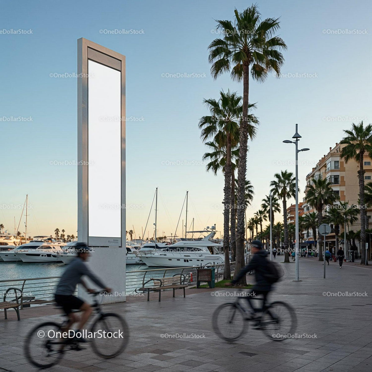 Cyclists Passing by Yacht Harbor and Palm Trees at Sunset JPG Mockup Image preview
