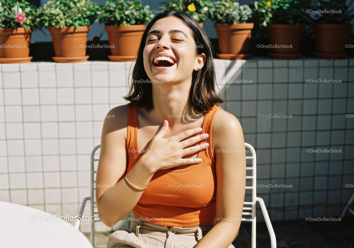 Joyful Woman Laughing Outdoors in Sunlight with Casual Style