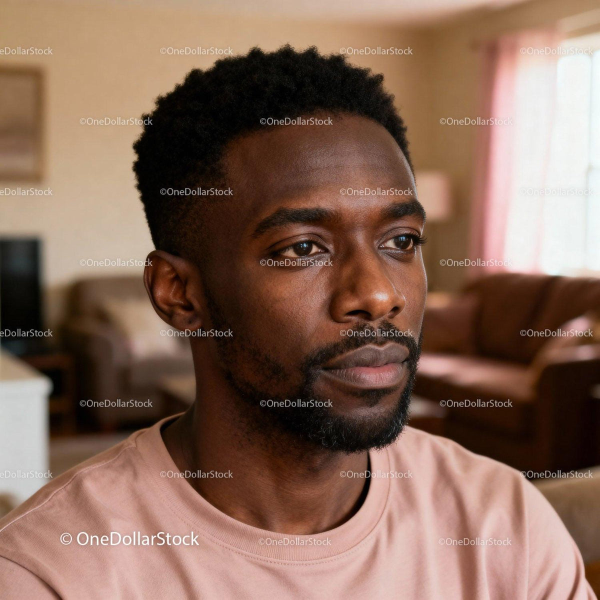 Thoughtful young man reflecting in cozy living room