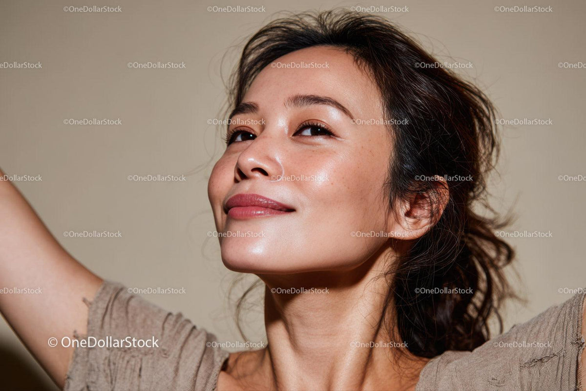 Portrait of a Smiling Woman with Radiant Skin and Joyful Expression