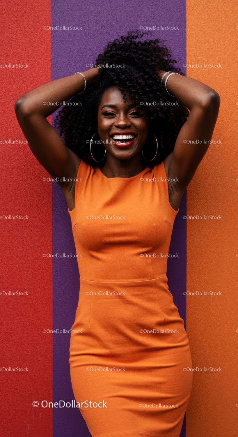 Vibrant Portrait of a Smiling Woman in Orange Dress Against Colorful Wall