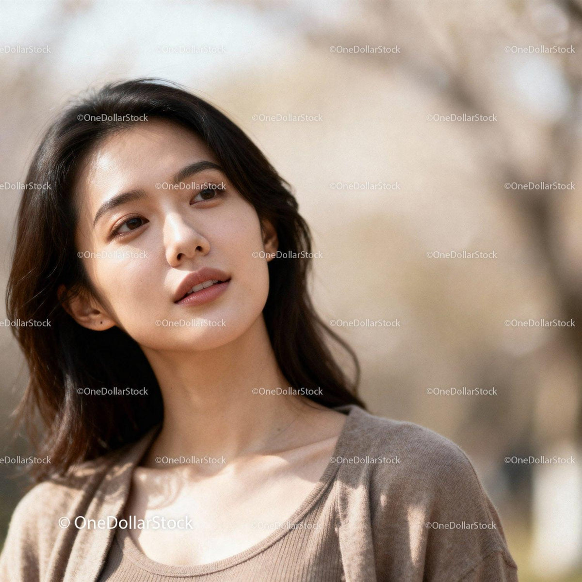 Young woman enjoying peaceful moment outdoors