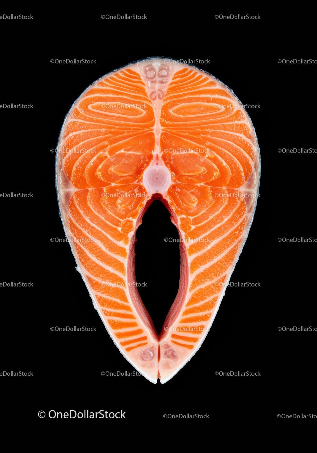 Fresh Raw Salmon Steak on Black Background