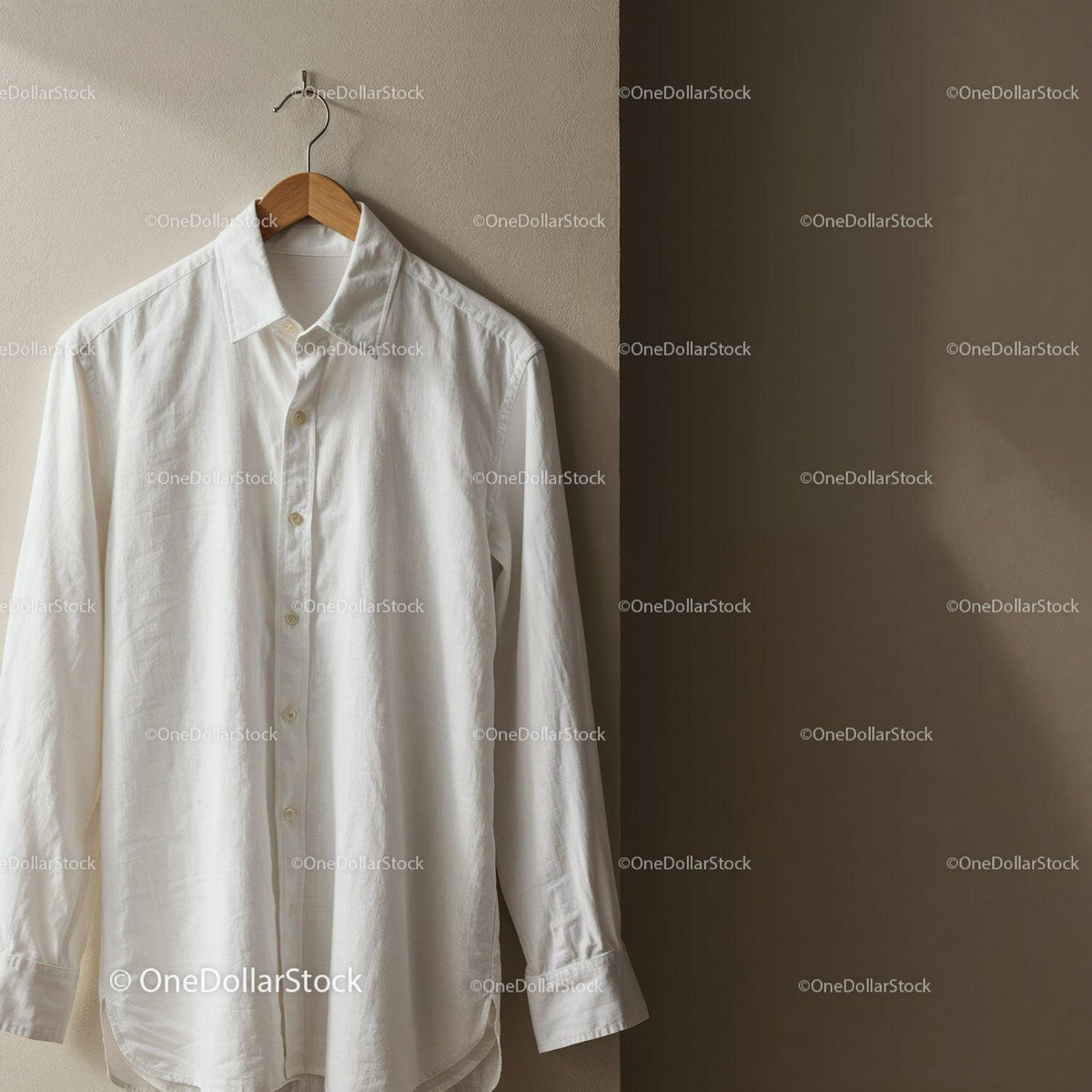 White button-up shirt hanging on wooden hanger JPG Mockup Image preview