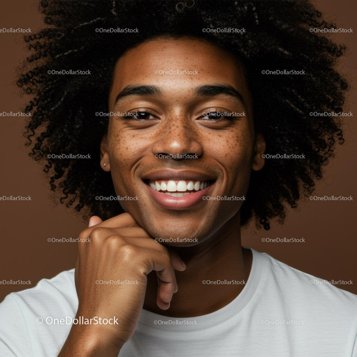 Portrait of a Smiling Woman with Curly Hair in Warm Studio Lighting