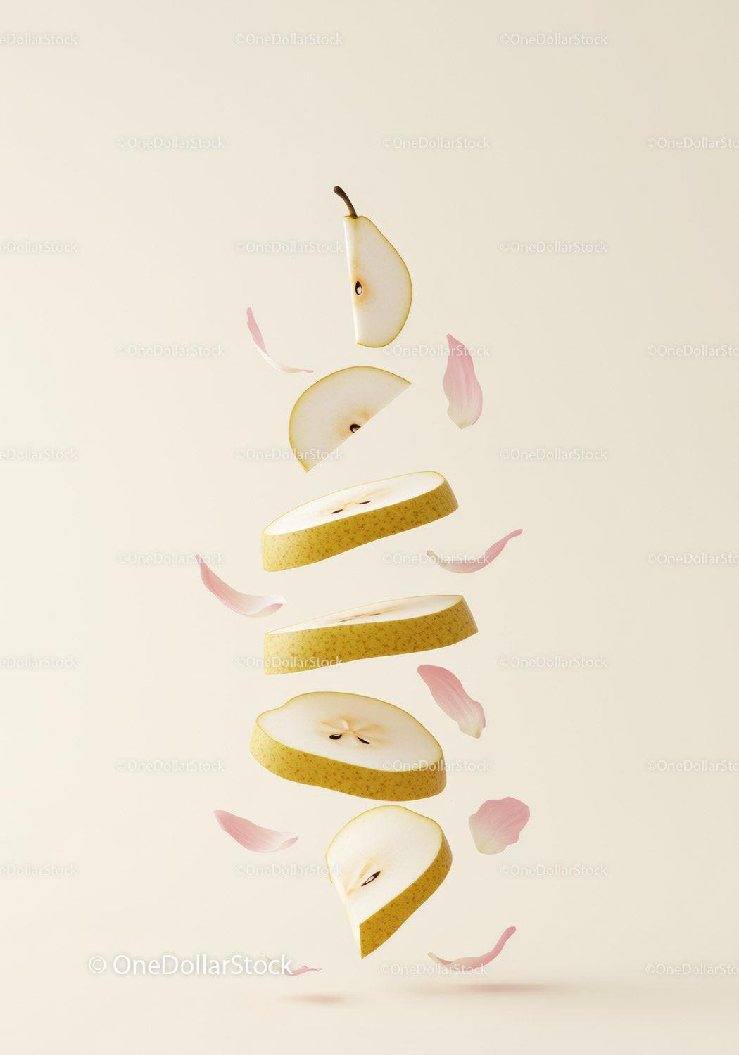 Floating Slices of Pear with Delicate Pink Petals