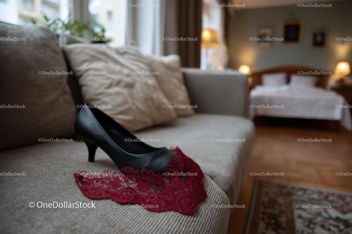 Chic Black Heels and a Red Lace Dress in a Cozy Bedroom Setting Stock Photo Bundle preview 32
