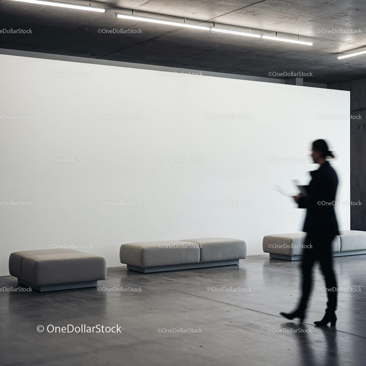 Blurred businesswoman walking past modern gray benches JPG Mockup Image preview