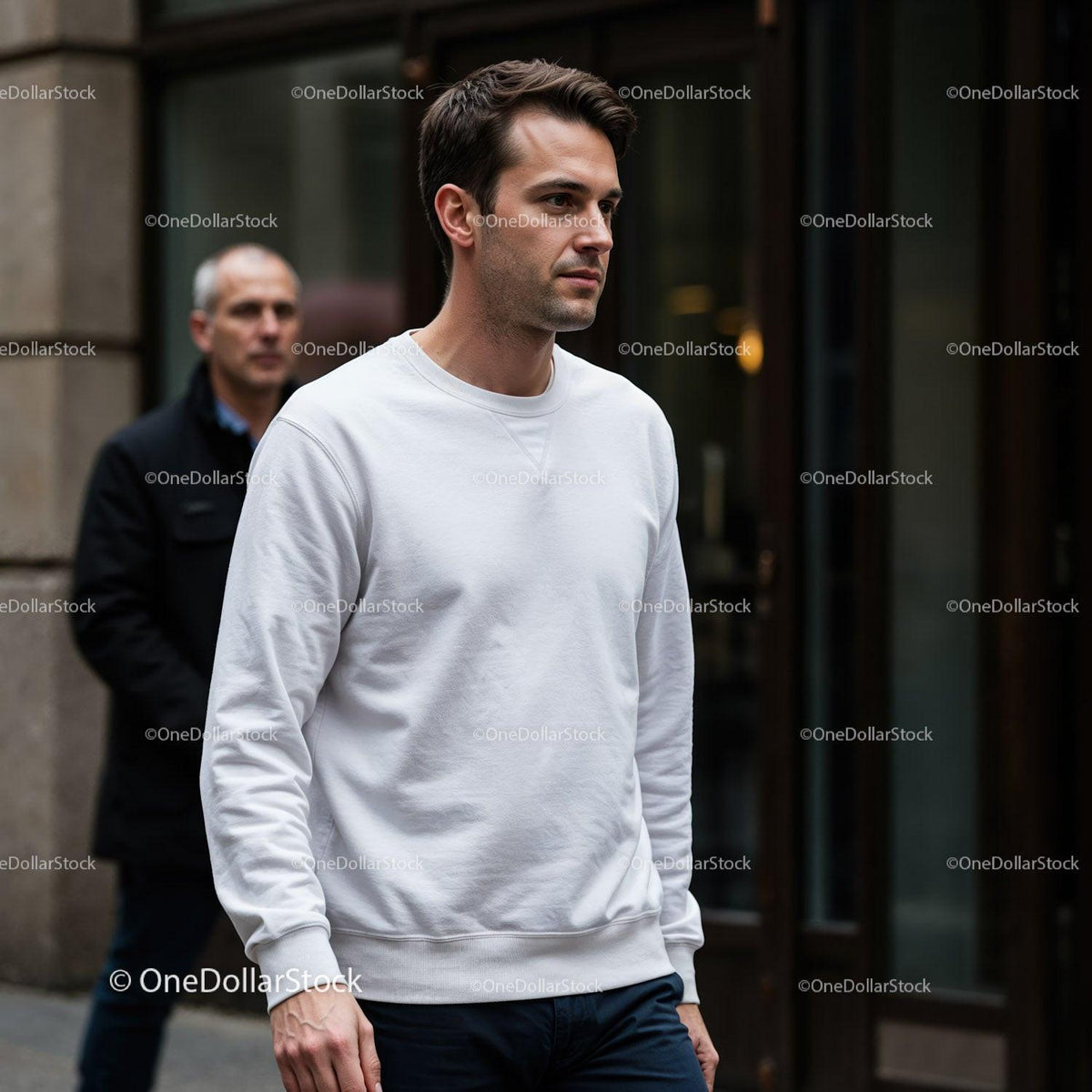 Young man walking on city street in casual white sweatshirt JPG Mockup Image preview