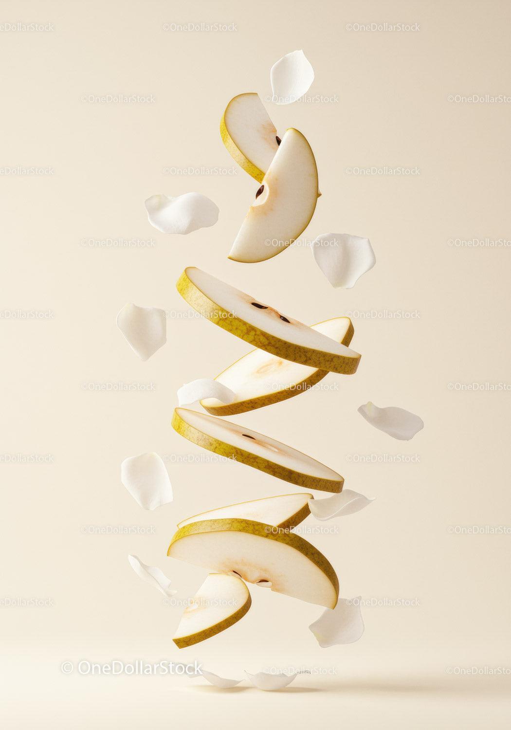 Floating Slices of Pear with Delicate White Petals