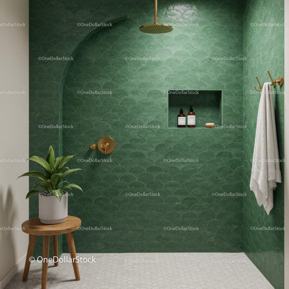 Minimalist green tiled shower with elegant brass fixtures
