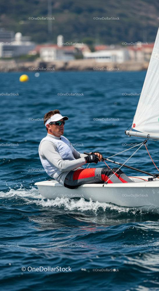Man Sailing a Small Yacht in Blue Ocean Water Stock Photo Bundle preview 7