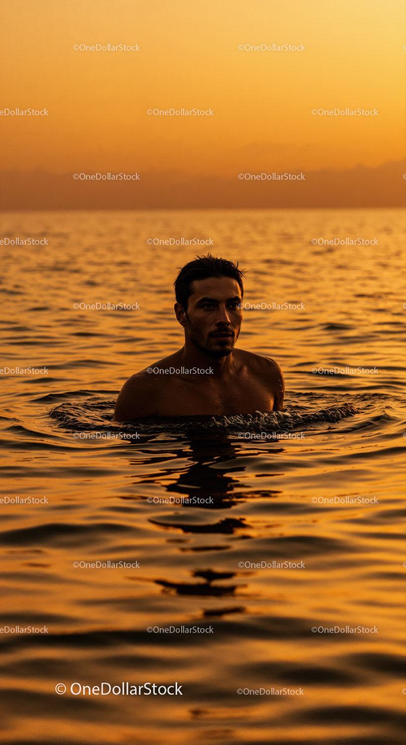 Serene Man Swimming in Ocean During Vibrant Sunset Stock Photo Bundle preview 15