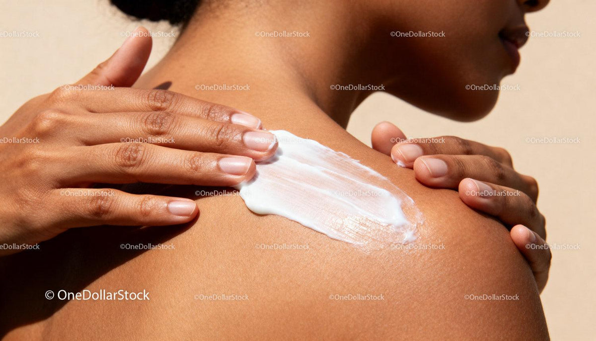 Applying moisturizing cream on smooth shoulder skin