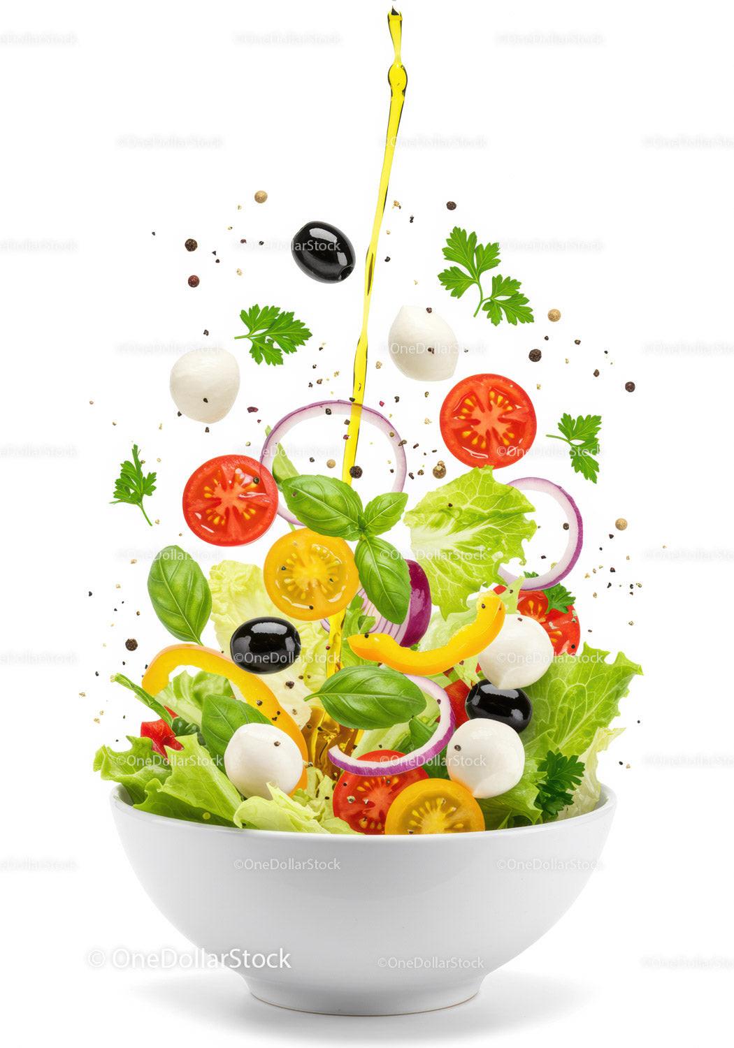 Fresh colorful salad with olive oil drizzle and herbs