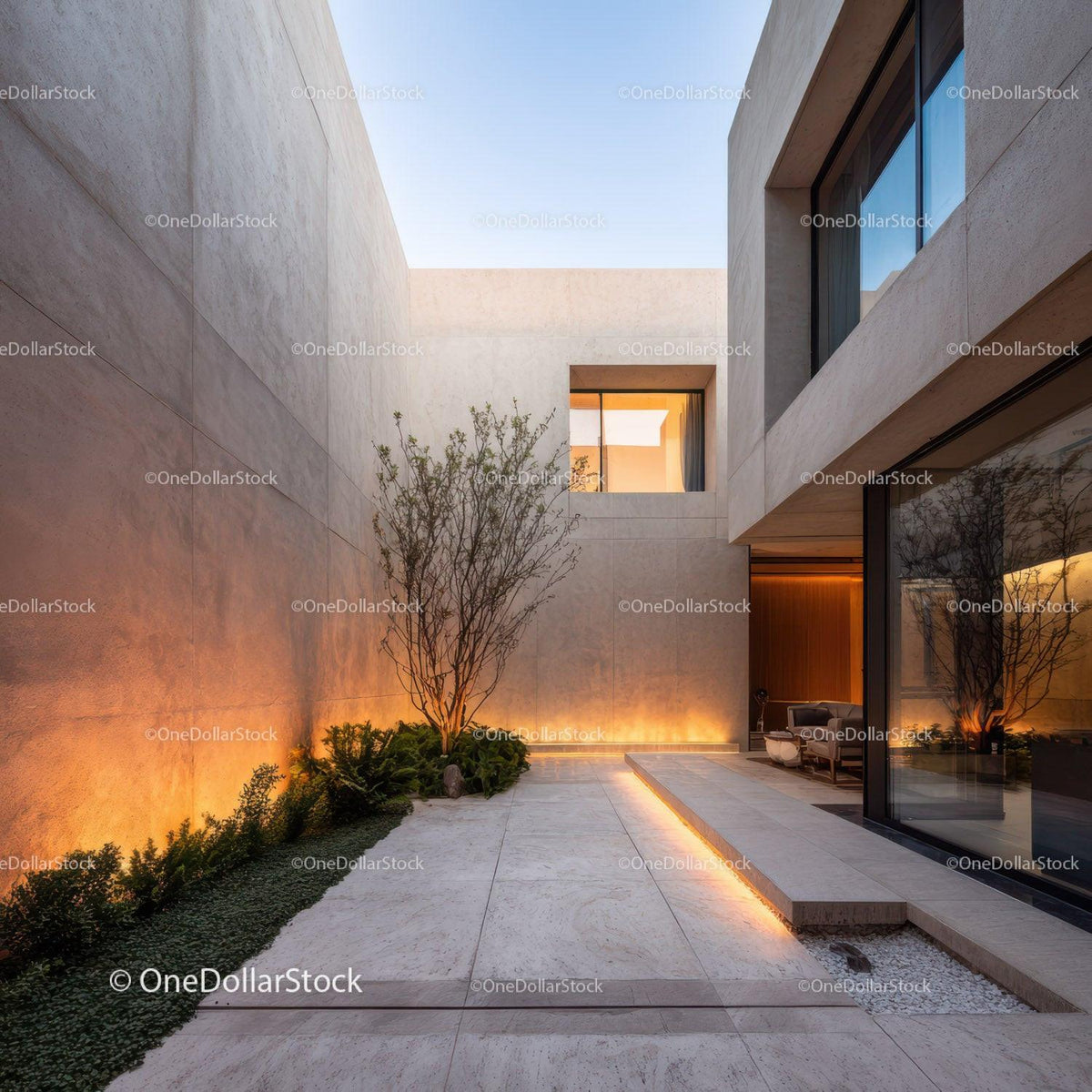Modern minimalist courtyard with landscaped garden and ambient lighting