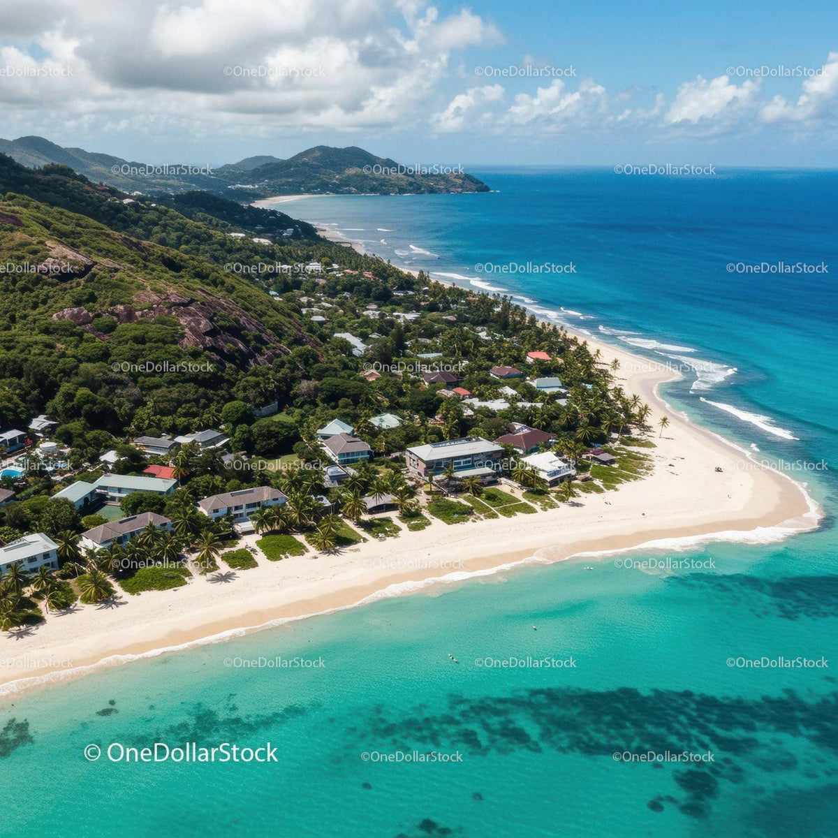 Breathtaking Tropical Beach with White Sand and Lush Green Hills