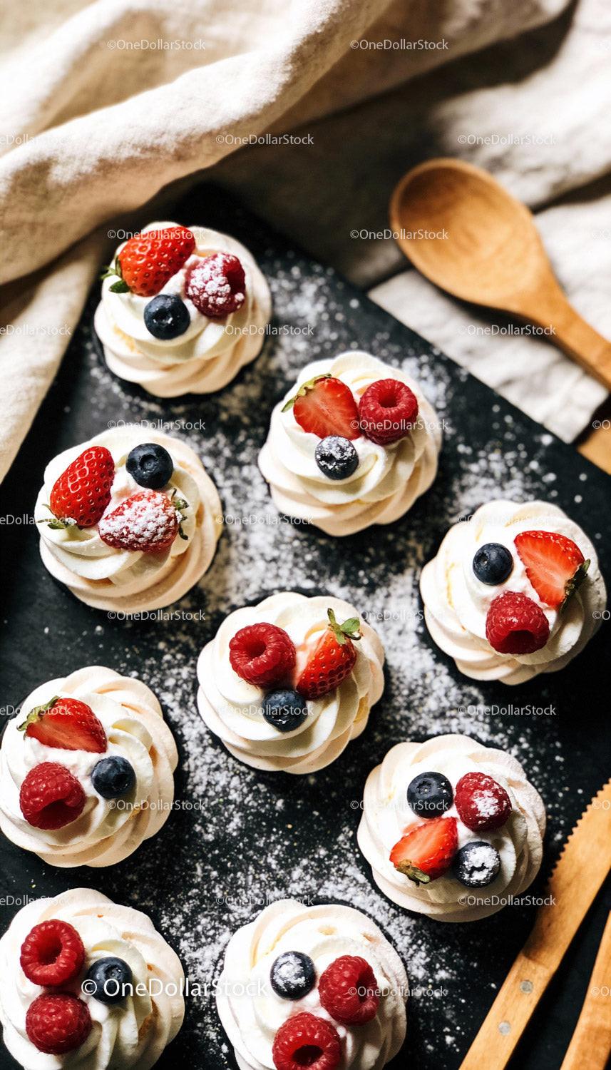 Delicate Meringue Cups with Fresh Berries and Cream