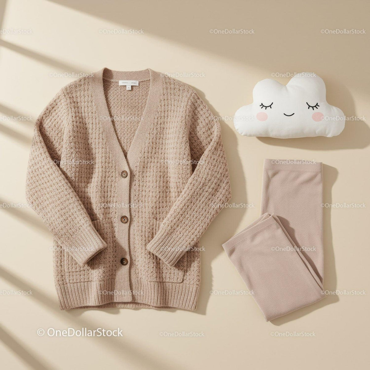 Cozy knit cardigan and soft leggings with plush cloud pillow