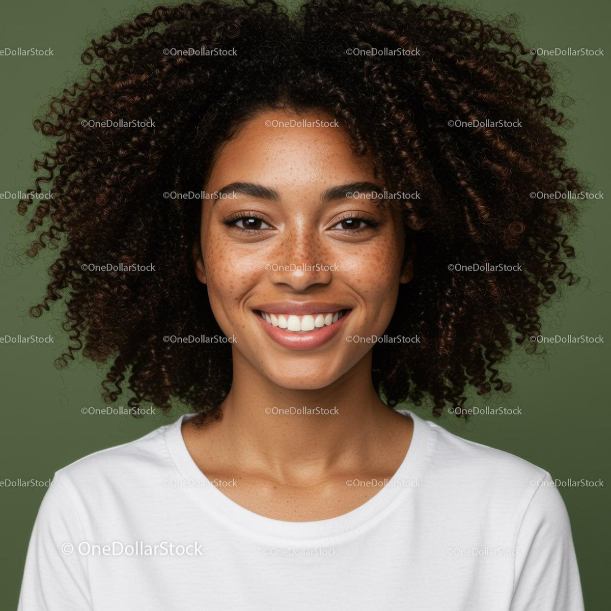 Portrait of a Smiling Woman with Curly Hair Against Green Background