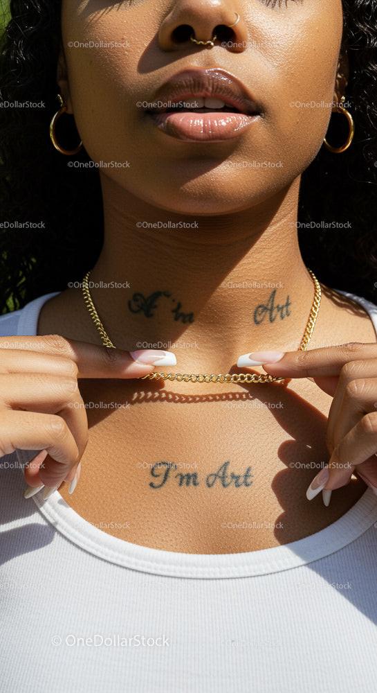 Close-Up of Fashionable Woman with Bold Tattoos and Jewelry