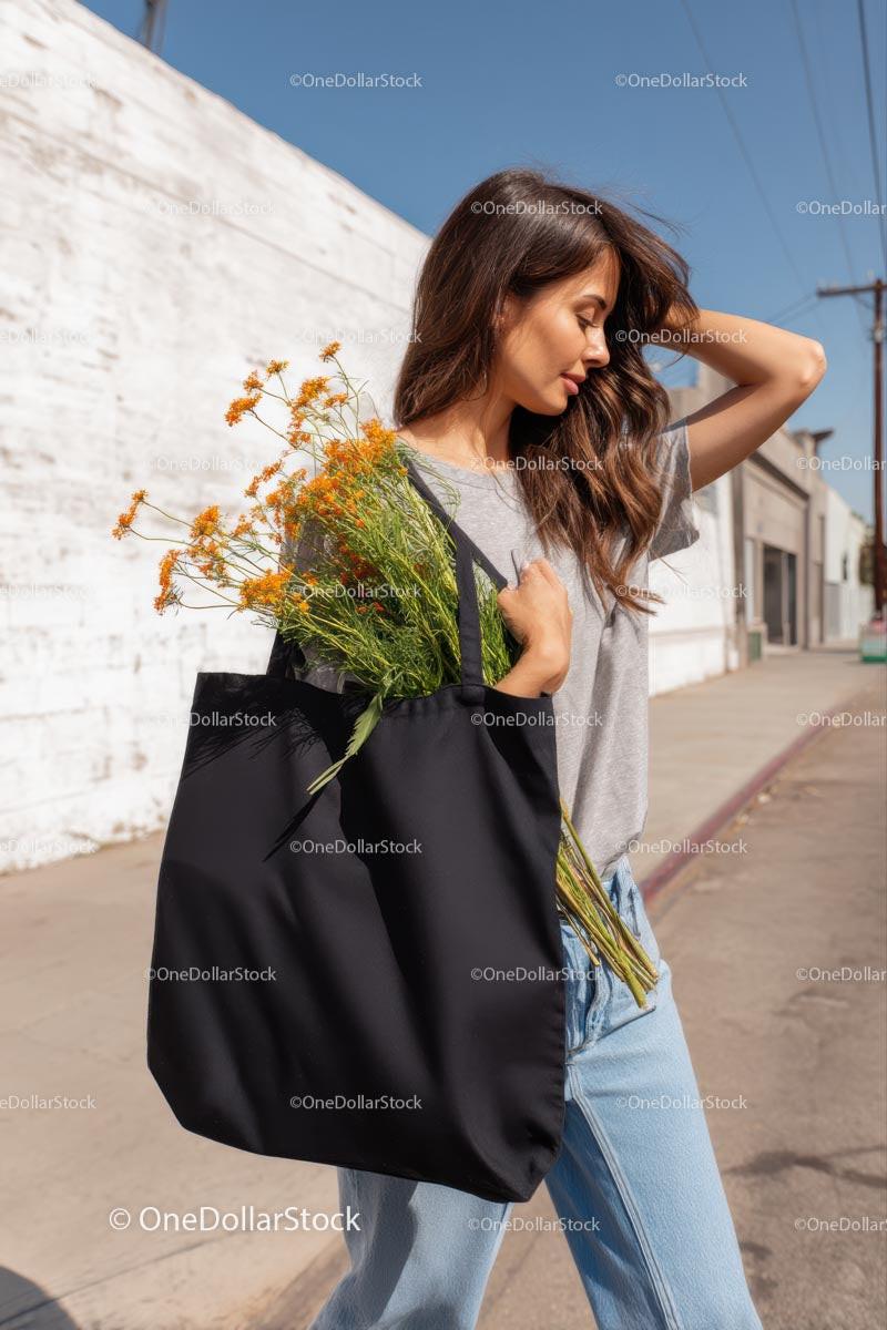 Woman Carrying Wildflower Bouquet on Urban Street