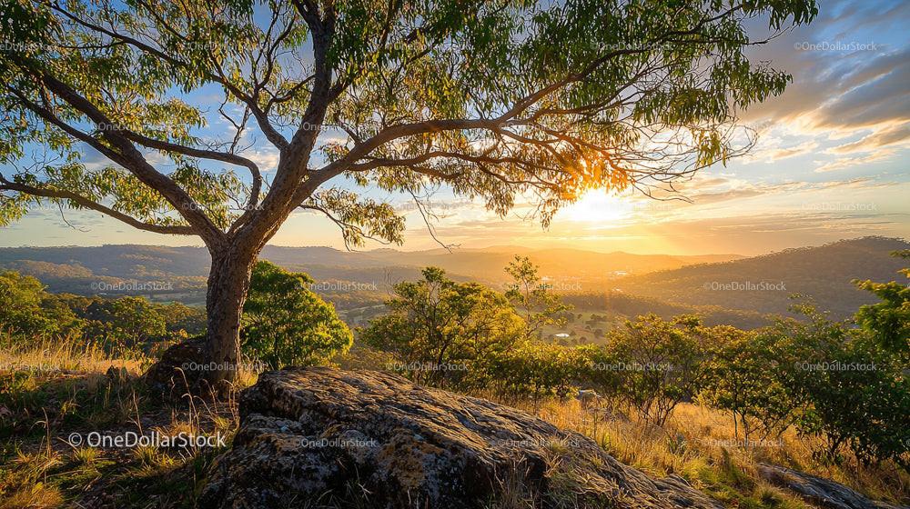 Golden Hour Over Scenic Mountain and Valley Landscape