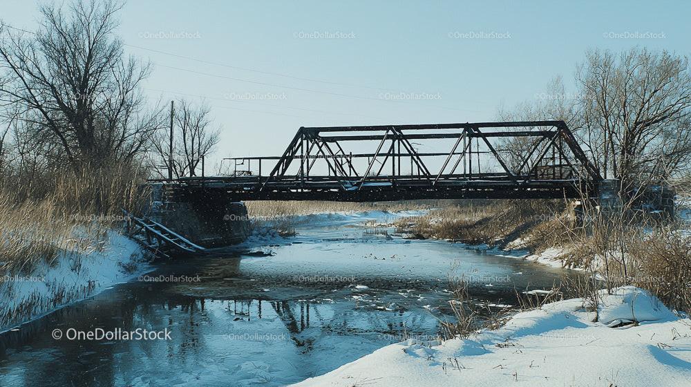 Iron Bridge Spanning a Frozen Winter River Landscape