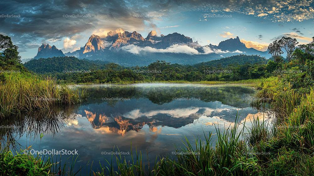 Majestic Mountain Reflections Over Serene Lake at Dusk