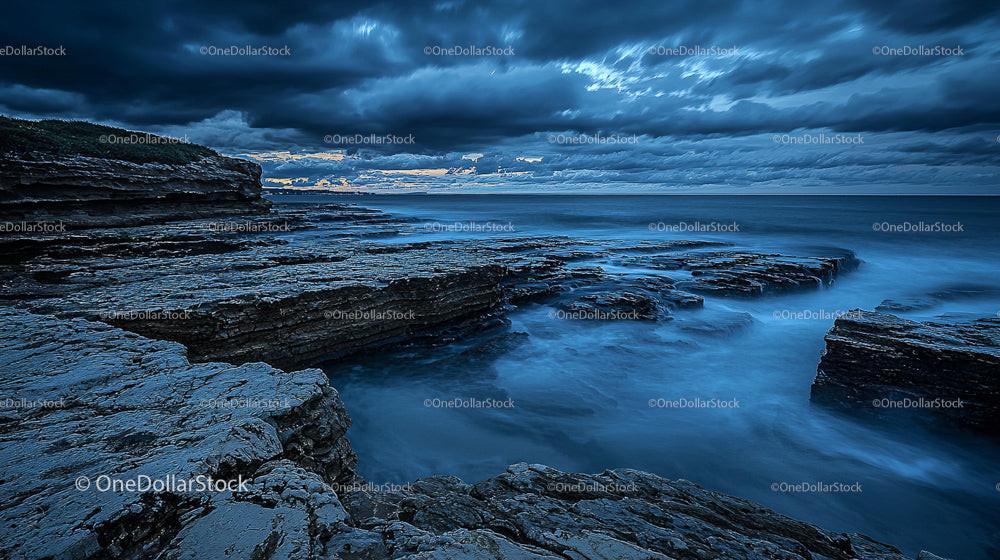 Dramatic Coastal Landscape with Stormy Sky and Rugged Cliffs