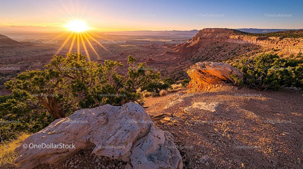 Sunset Over Utah Canyon with Rocky Cliffs and Greenery