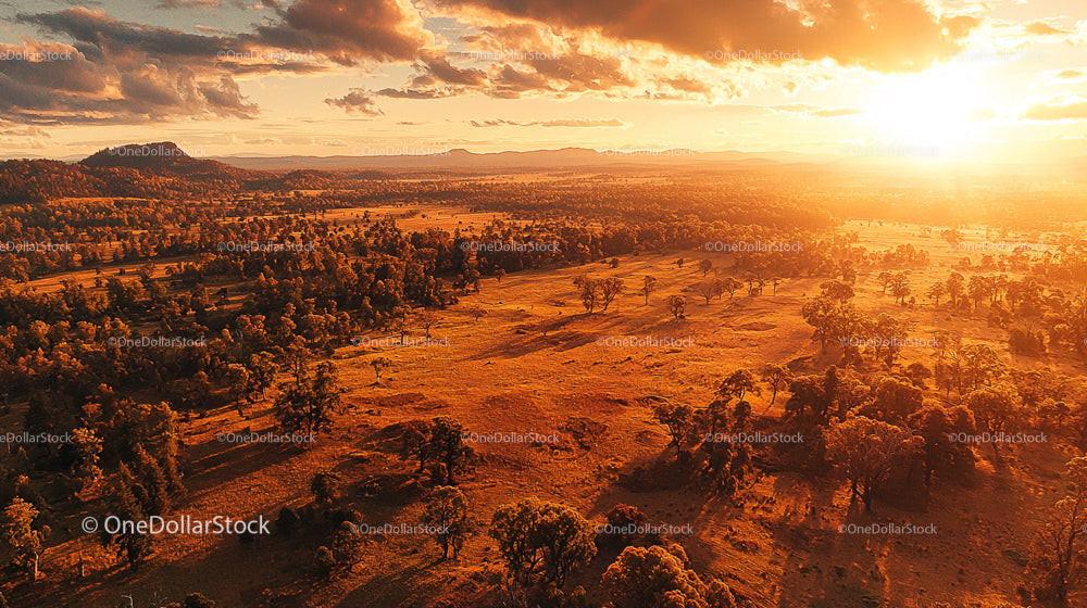 Golden Sunset Over Expansive Rural Landscape