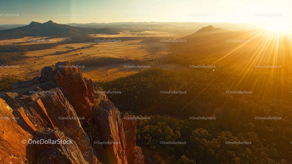 Golden Sunset Over Rugged Mountain Landscape