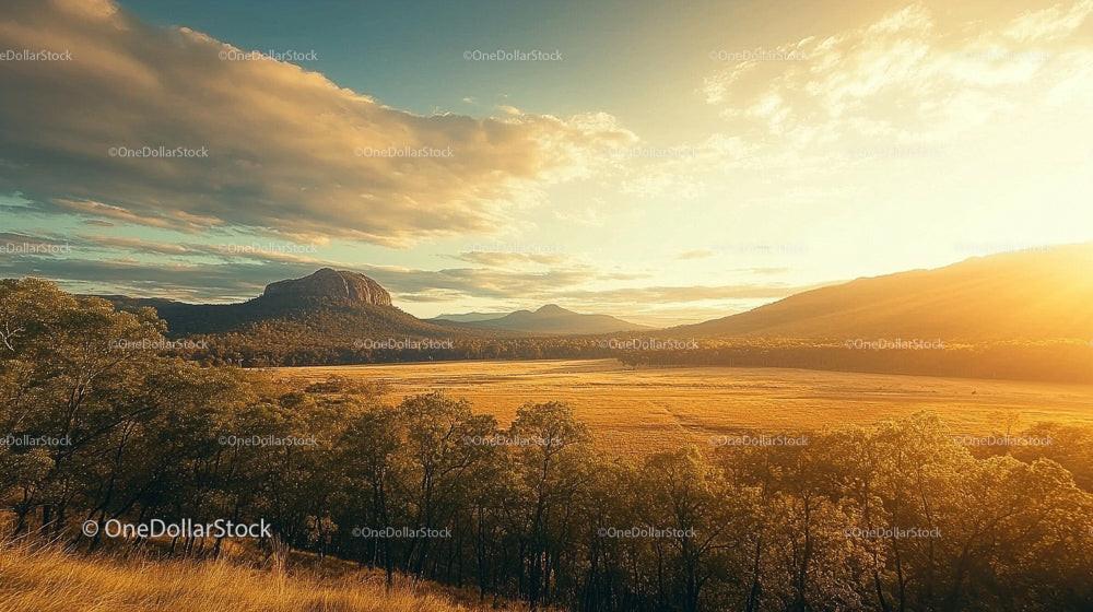 Golden Hour Over Scenic Mountain and Countryside