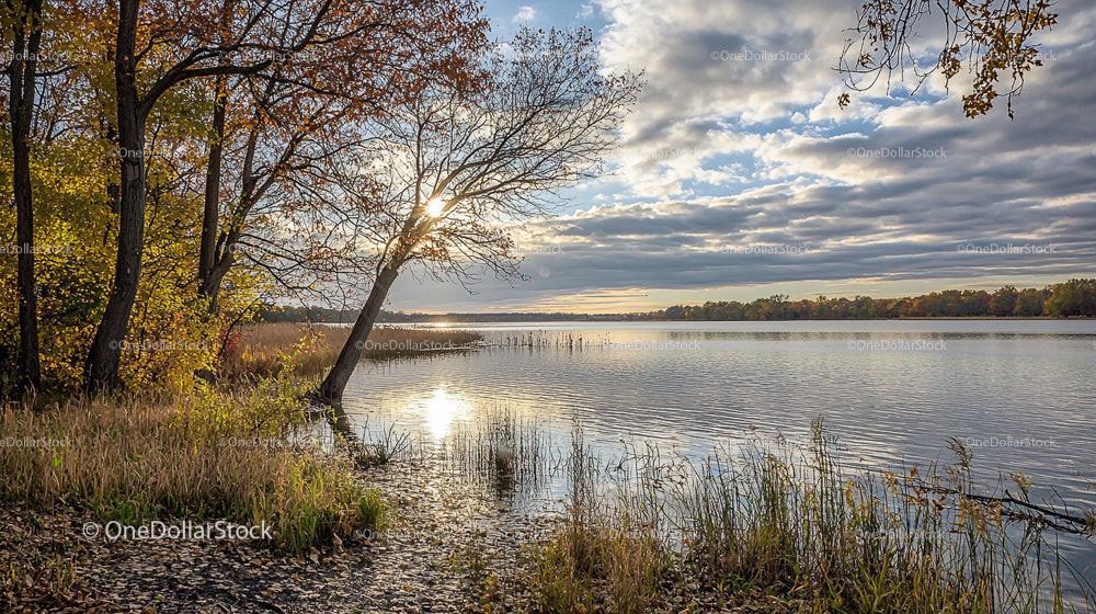Serene Autumn Sunset by a Tranquil Lakeside